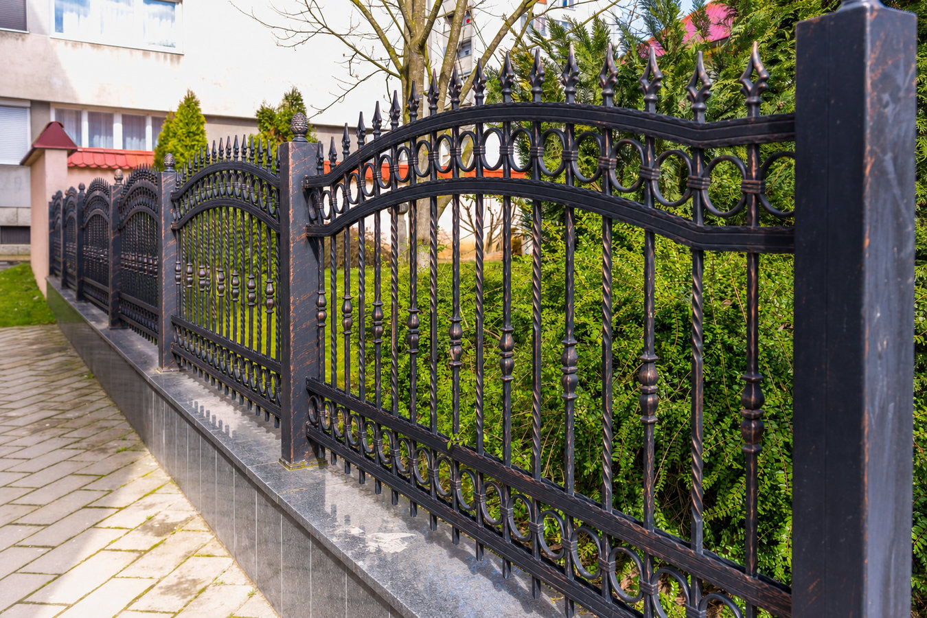 Ornamental iron fence installation